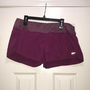 Purple Nike shorts, size medium